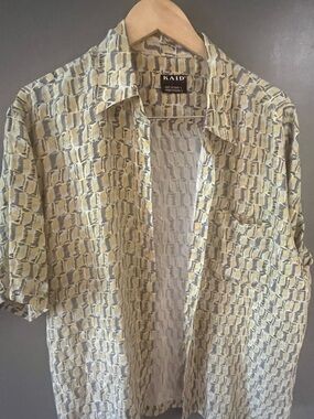 Kaid Button Down

• pattern
• 100% silk